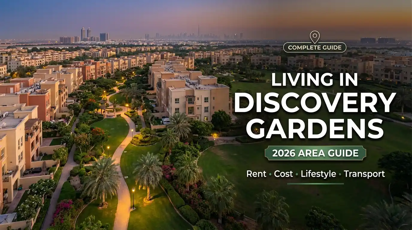 Aerial view of Discovery Gardens at twilight, highlighting the community's signature low-rise buildings, lush green parks, and walkable pedestrian pathways for the 2026 Area Guide.